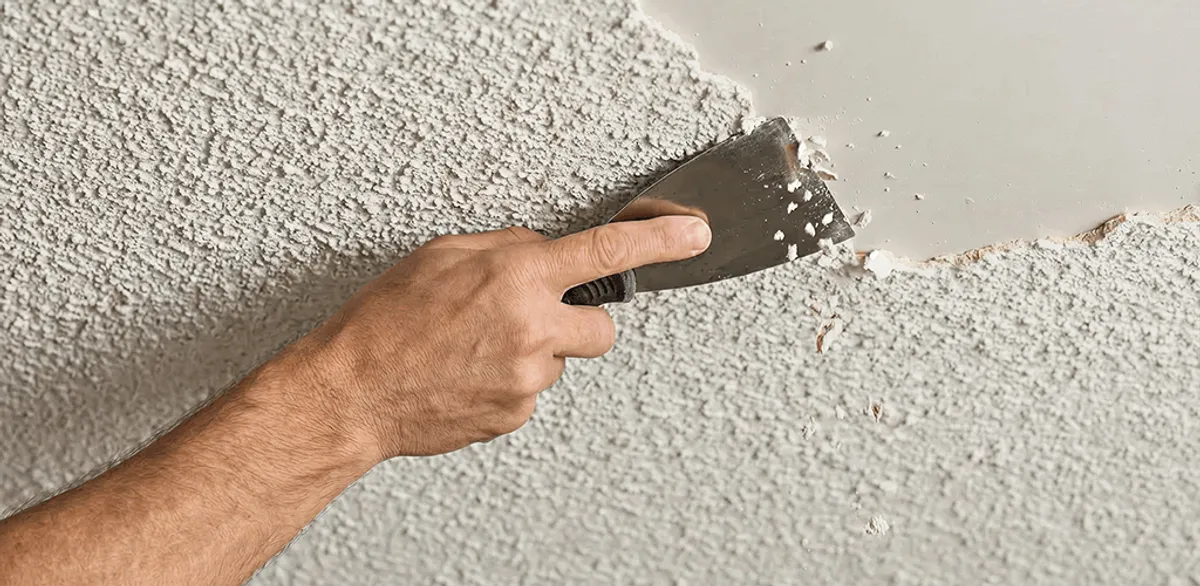 Popcorn ceiling removal scraping off textured ceiling finish in Cambridge, MA