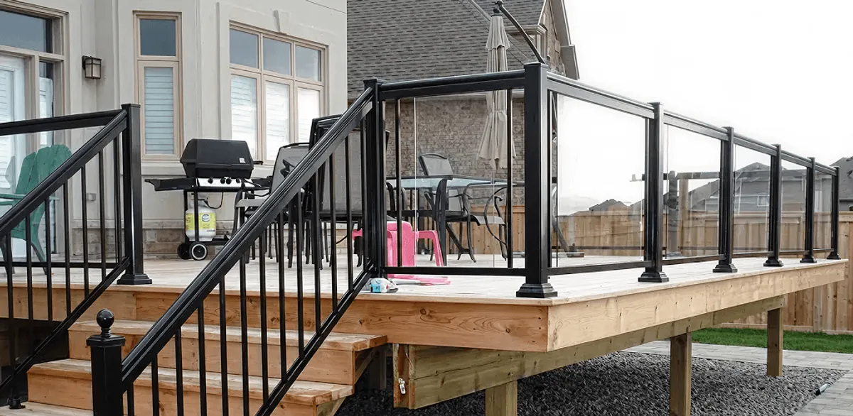Handrail installation on a deck staircase for safety and code compliance in Cambridge, MA